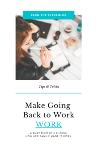 A woman works at her desk